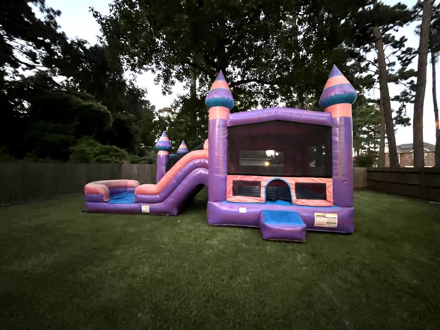 Girls Castle Combo — pink and purple bounce house with slide and splash pool